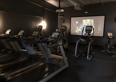 Workout and a Movie in the Cardio Cinema Room at Physiq Keizer